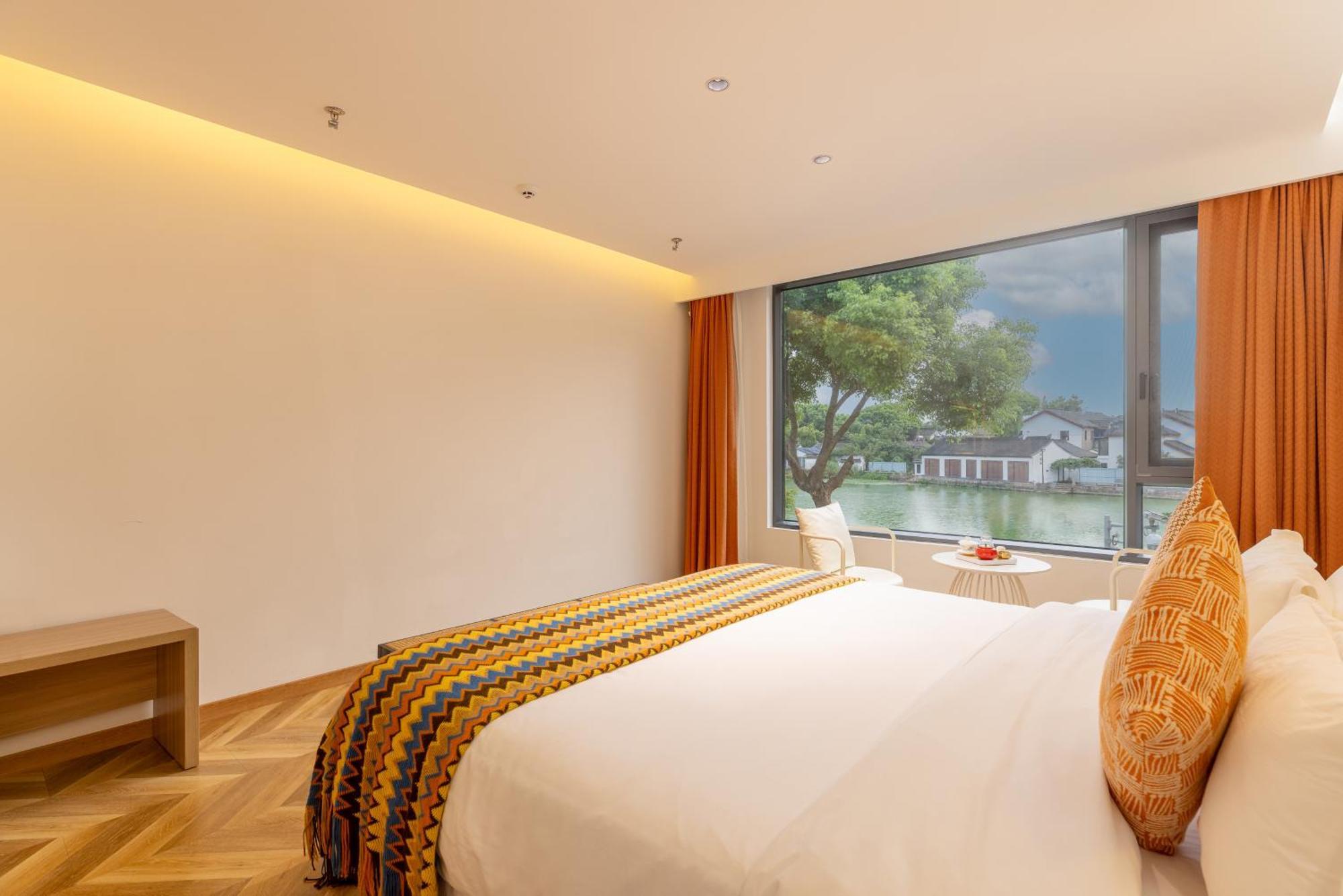 Suzhou Zhouzhuang Slowlife River View Lnn كونشان المظهر الخارجي الصورة